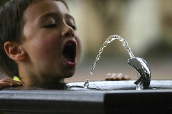 Image result for child drinking water